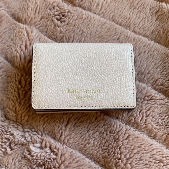 kate spade Handbags - Kate spade Eva trifold wallet rose smoke